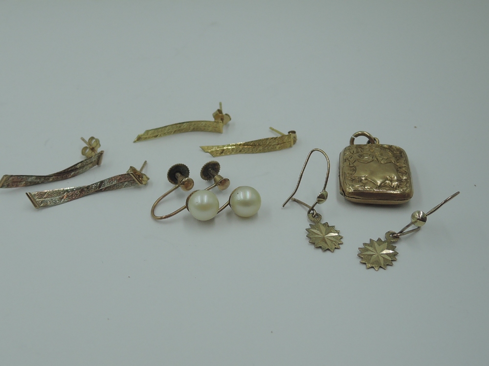 Three pairs of 9ct gold stud and loop earrings including woven drop and star cut panels, a pair of