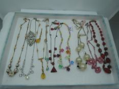 Nine vintage necklaces including yellow metal wire and bead, diamante, facetted coloured glass etc a