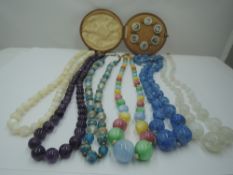 Six strings of vintage beads including mother of pearl, multi coloured glass etc and a cased set