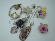 A small selection of vintage costume jewellery including silver filligree flower brooch, pink