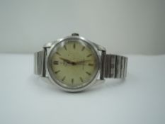 A gent's 1950's Tudor Oyster Royal wrist watch no:7903,79352 having arrow head baton dial to