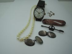 A small selection of vintage jewellery including a silver wrist watch having Arabic numeral dial