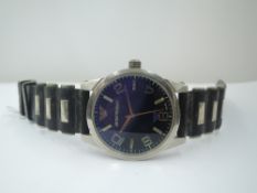 A gent's wrist watch by Emporio Armani, model no: AR-1011 having baton & Arabic numeral dial to blue