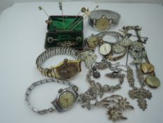 A selection of vintage costume jewellery including wrist watches, marcasite jewellery, diamante,