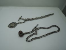 Two HM silver watch chains having barrel and medallion fobs, approx 76g