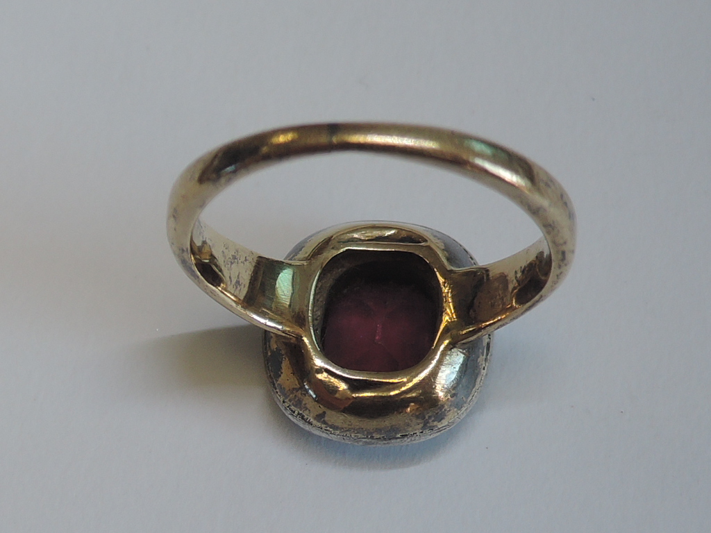 A lady's dress ring having a central pink stone possibly tourmaline in a collared mount with diamond - Image 5 of 5