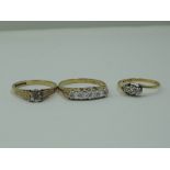 Three lady's dress rings of various forms, all having diamond chip decoration, two on 9ct gold loops