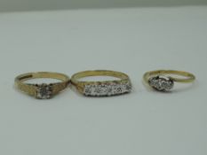 Three lady's dress rings of various forms, all having diamond chip decoration, two on 9ct gold loops