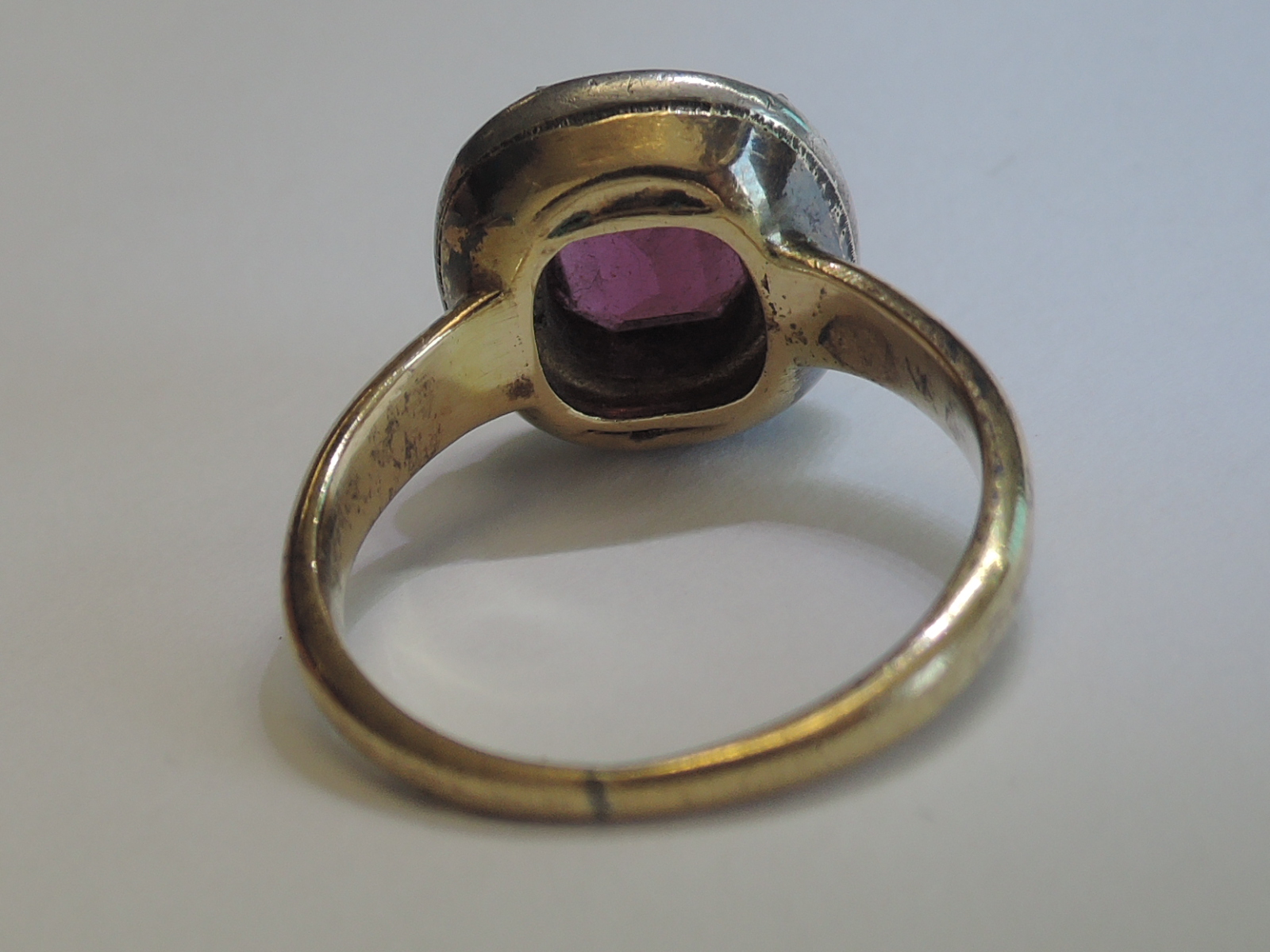 A lady's dress ring having a central pink stone possibly tourmaline in a collared mount with diamond - Image 4 of 5