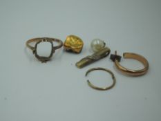 A small selection of yellow metal and 9ct gold jewellery including ring shank, odd earrings, pendant