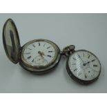 A Swiss white metal top wound pocket watch bearing Hahn mark to mechanism, having Roman numeral dial