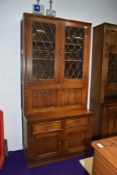 A Priory or Old Charm style dresser, part glazed, with lower drinks section, width approx. 95cm,