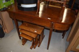 A Victorian D end side or hall table having tapered and inlayed legs