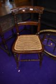 A Victorian stained frame cane seated bedroom chair