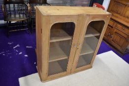 A Victorian stripped pine bookcase, width approx. 92cm, height 100cm