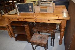 A heavy set pine kitchen table with drawer H76cm x W85cm x L150cm