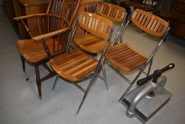 A set of FOUR fold away garden or similar dining chairs