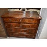 A late Victorian chest of four drawers having flame mahogany front with beaded fronts on bun feet