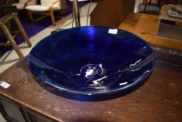 A Bristol style blue glass fruit bowl with ribbed design