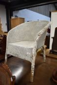 A Lloyd Loom style tub chair, good renovation project