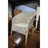 A Lloyd Loom style tub chair, good renovation project