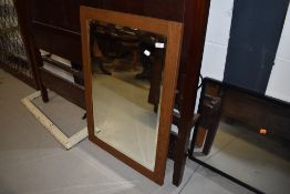 A simple oak framed bevel edged mirror H86cm x W60cm