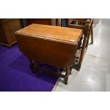 An early to mid 20th Century oak twist gateleg table having shaped top, width approx. 76cm