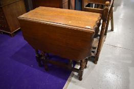An early to mid 20th Century oak twist gateleg table having shaped top, width approx. 76cm