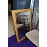 A reproduction gilt frame wall mirror, approx. 64 x 95cm