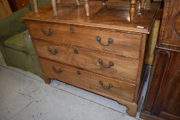 A late 19th/early 20th Century light mahogany chest of three drawers having beaded drawer fronts