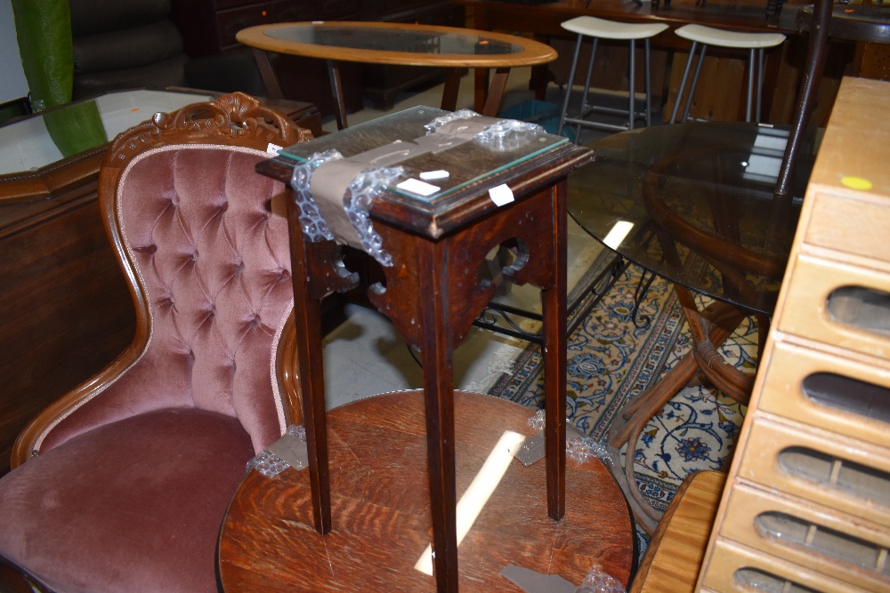 An oak plant stand having glass top standing at 55cm