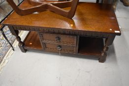 An old charm style solid oak coffee table having double drawer set H45cm x D48cm x L101cm