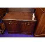 A mahogany effect low cupboard