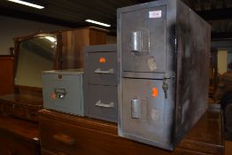 Three sets of metal postage drawers or similar storage boxes