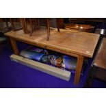 A good quality light stain refectory kitchen dining table with frieze drawers