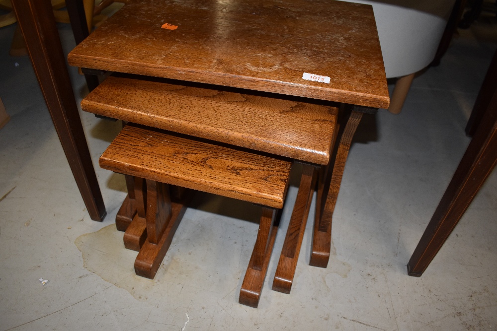 A small nest of solid oak wood table good sturdy design