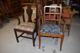 Two smokers style chairs one oak and similar both having embroidered seats