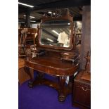 A Victorian style mahogany duchess dressing table, width approx. 122cm