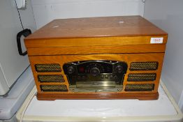 A vintage styled Hi Fi turntable unit and compact disk player