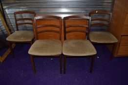 A vintage G plan or similar teak gateleg table and four rail back chairs, chairs labelled as G plan,