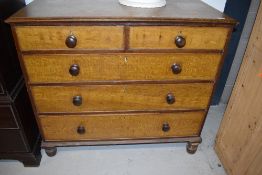 A set of antique scumble finished chest of two over three drawers with cock beaded fronts having