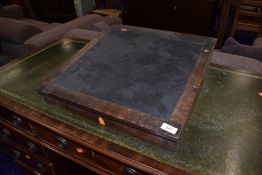 A stained frame lap desk for restoration
