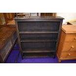 A set of dark oak bookshelves, dimensions approx. W92cm H107cm D23cm