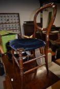 A mahogany bed room chair having balloon back and turned frame