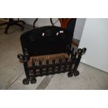 A traditional cast fire grate approx. 56 x 28cm