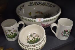 A selection of ceramics by Portmeirion in the botanical design three small bowls one large fruit