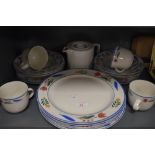 A selection of table and kitchen wares including Tienshan Stoneware mugs plates and bowls