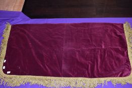 A velvet and tassel vestibule or ceremonial cloth cover