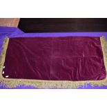 A velvet and tassel vestibule or ceremonial cloth cover