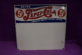 An enamel reproduction sign for Pepsi Cola